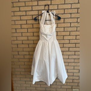 White tea length halter top rockabilly style swing dress.